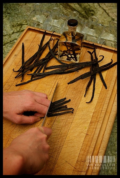Rachelle Weymuller cuts the vanilla beans to fit into the bottle for making homemade pure vanilla extract